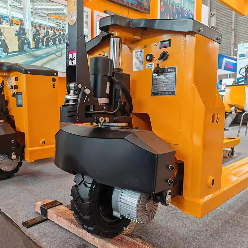 Walkie electric pallet jack handling materials on the warehouse floor